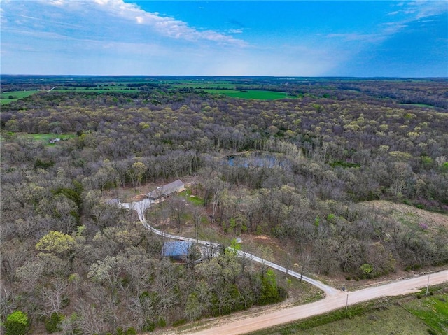 10200 SE 1075th Rd, Collins, MO 64738 - aerial overview of property's location featuring a heavily wooded area
