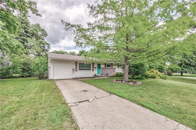 4306 W 78th Ter, Prairie Village, KS 66208 - ranch-style house with a garage, concrete driveway, and a front yard