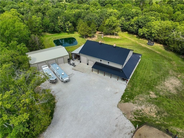 view of subject property featuring a forest