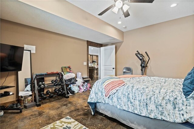 bedroom with recessed lighting, finished concrete flooring, and ceiling fan
