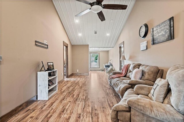 living room featuring light wood-style flooring, wooden ceiling, ceiling fan, baseboards, and recessed lighting