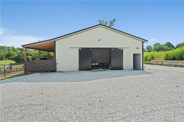 view of outbuilding featuring an outbuilding and an exterior structure
