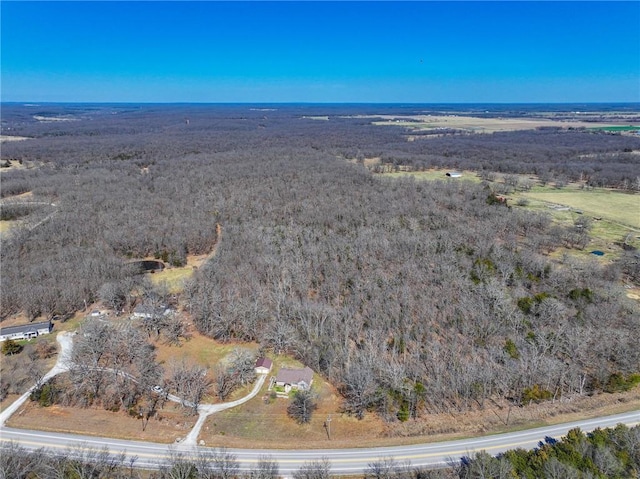 10875 SE 54th Hwy, Collins, MO 64738 - view of property location with a heavily wooded area