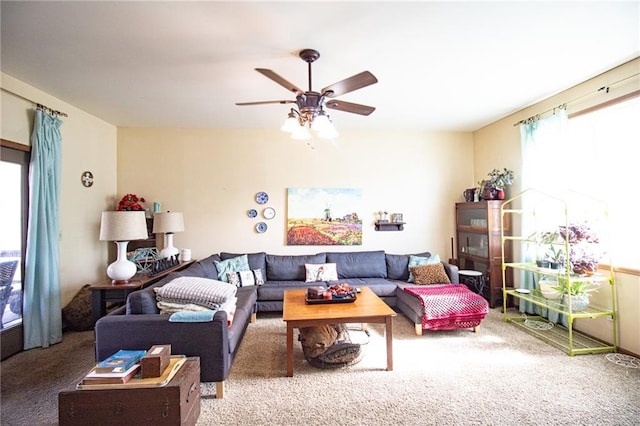 10875 SE 54th Hwy, Collins, MO 64738 - carpeted living room with a ceiling fan