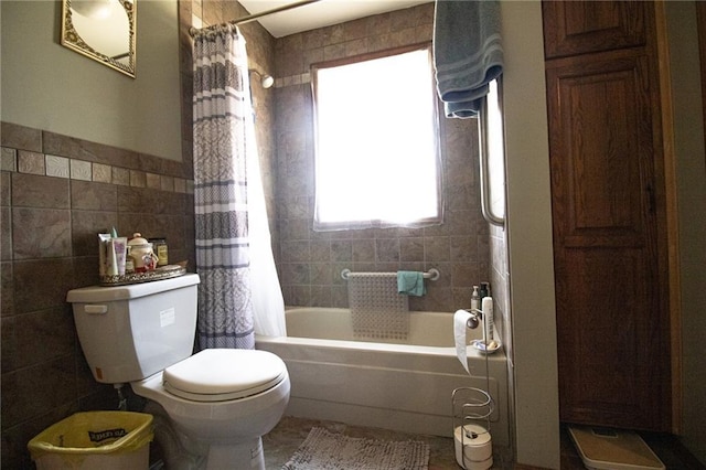 10875 SE 54th Hwy, Collins, MO 64738 - bathroom featuring tile walls, toilet, and shower / bath combination with curtain