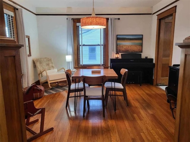 dining room with wood finished floors