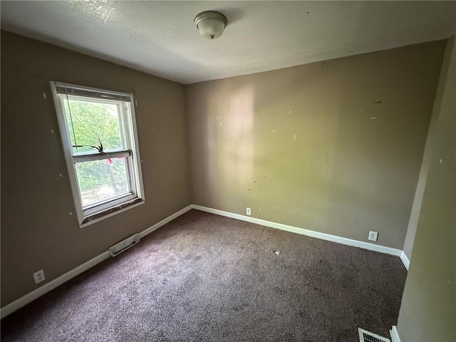 2544 S Overton Ave, Independence, MO 64052 - spare room with carpet floors and baseboards
