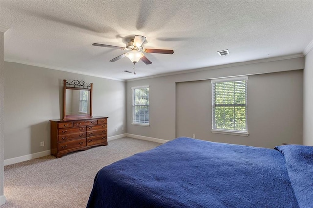 14037 W 112th Ter, Olathe, KS 66062 - bedroom with crown molding, carpet flooring, ceiling fan, a textured ceiling, and baseboards