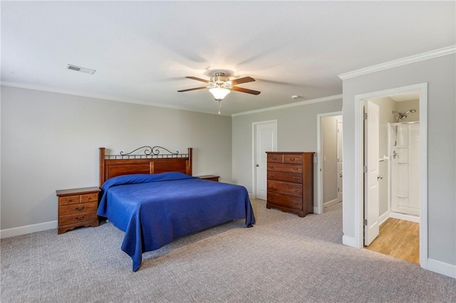 14037 W 112th Ter, Olathe, KS 66062 - carpeted bedroom with ornamental molding, baseboards, ceiling fan, and connected bathroom