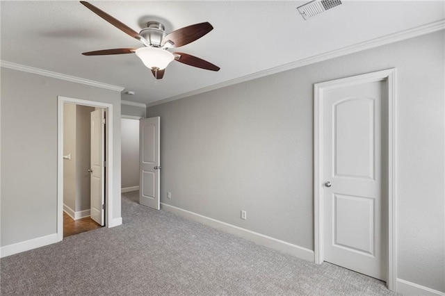 14037 W 112th Ter, Olathe, KS 66062 - unfurnished bedroom with crown molding, carpet, baseboards, and ceiling fan