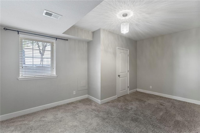14037 W 112th Ter, Olathe, KS 66062 - unfurnished bedroom featuring carpet flooring, baseboards, and a textured ceiling