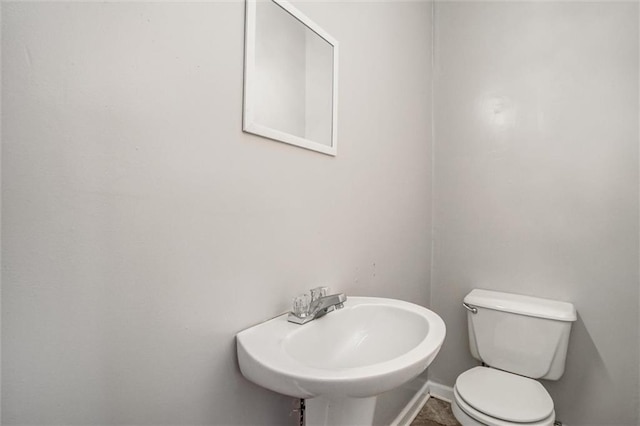628 S Huttig Ave, Independence, MO 64053 - bathroom with a sink and toilet