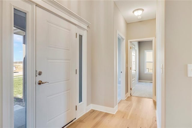 10201 N Winchester Ave, Kansas City, MO 64156 - hall with light wood-style flooring and baseboards