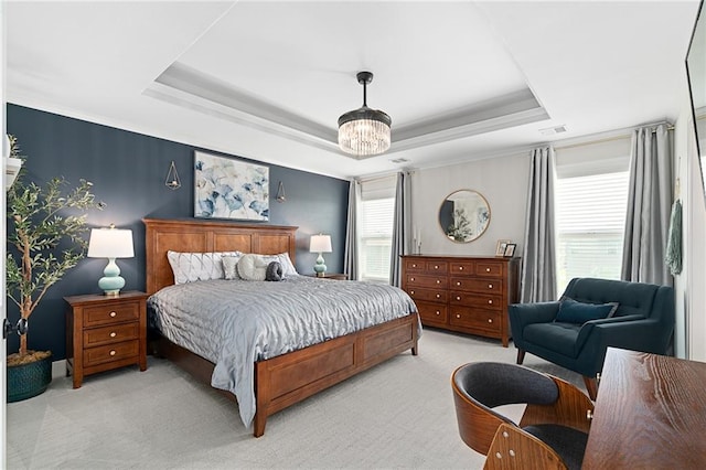 18873 W 168th Ter, Olathe, KS 66062 - bedroom featuring a raised ceiling, light colored carpet, and a chandelier