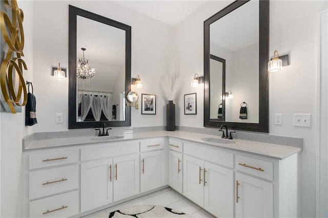 18873 W 168th Ter, Olathe, KS 66062 - full bathroom featuring double vanity, tile patterned flooring, and a chandelier