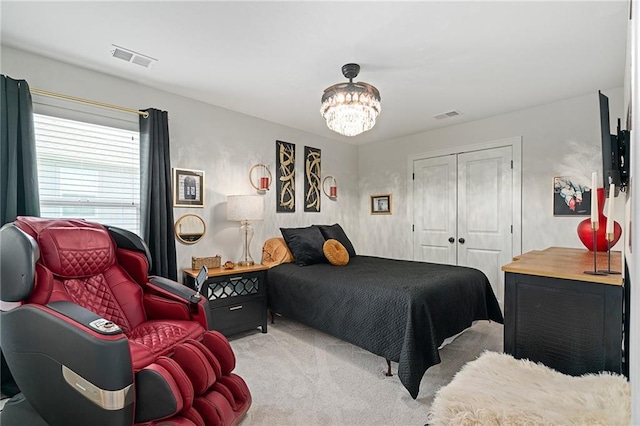 18873 W 168th Ter, Olathe, KS 66062 - bedroom featuring light colored carpet, a chandelier, and a closet
