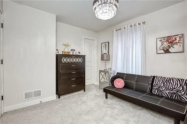 18873 W 168th Ter, Olathe, KS 66062 - sitting room featuring carpet flooring, a chandelier, and baseboards