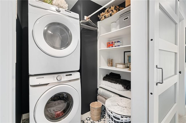 18873 W 168th Ter, Olathe, KS 66062 - clothes washing area featuring stacked washing machine and dryer