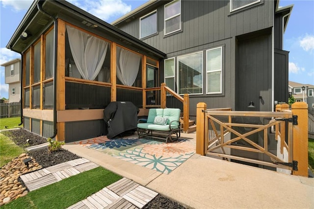 18873 W 168th Ter, Olathe, KS 66062 - view of patio / terrace featuring area for grilling, a sunroom, and fence