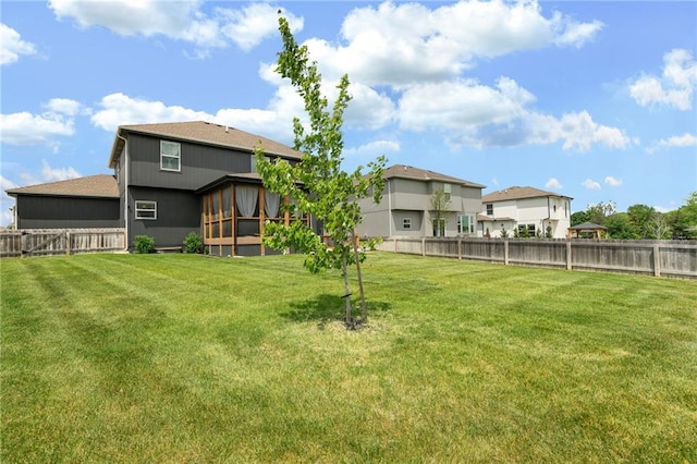 18873 W 168th Ter, Olathe, KS 66062 - view of yard with a sunroom and a residential view