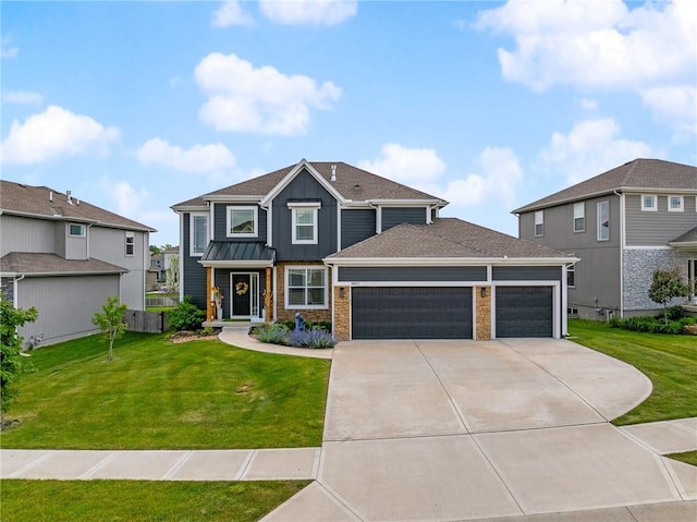 18873 W 168th Ter, Olathe, KS 66062 - view of front of home featuring an attached garage, driveway, a front yard, brick siding, and board and batten siding