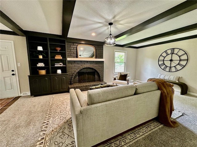 living room with carpet flooring, beam ceiling, baseboards, a brick fireplace, and a textured ceiling