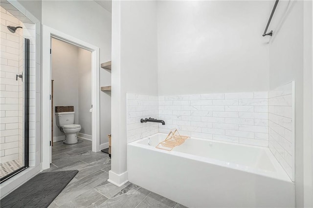 1309 NW 107th Ter, Kansas City, MO 64155 - full bathroom featuring a shower stall, toilet, a garden tub, and baseboards