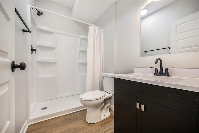 1309 NW 107th Ter, Kansas City, MO 64155 - full bath with wood finished floors, toilet, a stall shower, and vanity