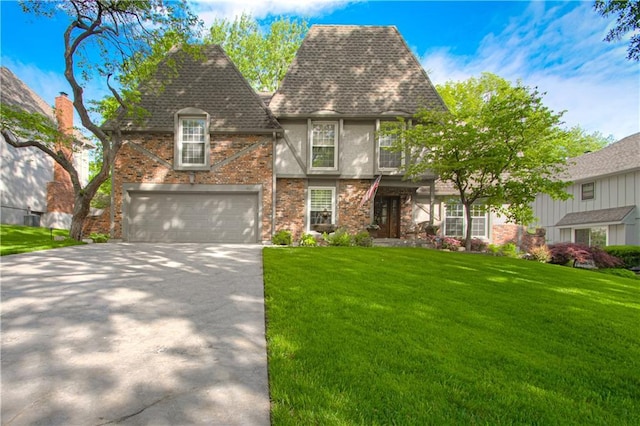 410 W 130th Ter, Kansas City, MO 64145 - view of front of property featuring concrete driveway, a front lawn, a garage, and brick siding