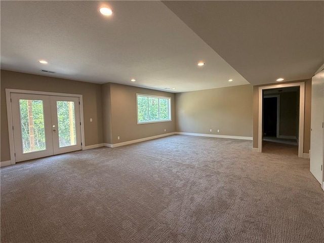 202 E Maple St, Lone Jack, MO 64070 - unfurnished room featuring recessed lighting, carpet, and french doors