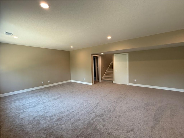 202 E Maple St, Lone Jack, MO 64070 - spare room featuring recessed lighting, stairs, carpet floors, and a textured ceiling
