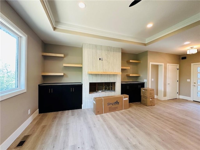 202 E Maple St, Lone Jack, MO 64070 - kitchen with open shelves, a tray ceiling, light wood finished floors, recessed lighting, and a ceiling fan
