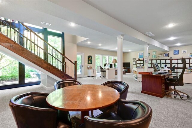 carpeted dining space featuring ornate columns, an office area, recessed lighting, and stairway