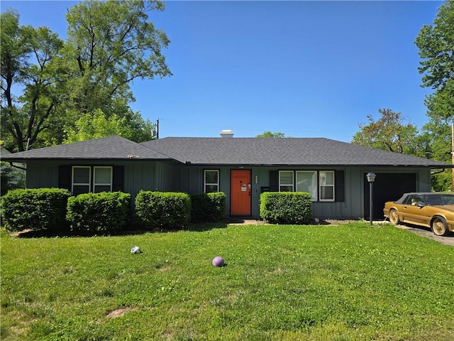 8511 E 110th Ter, Kansas City, MO 64134 - ranch-style home featuring board and batten siding, a garage, a front lawn, and roof with shingles