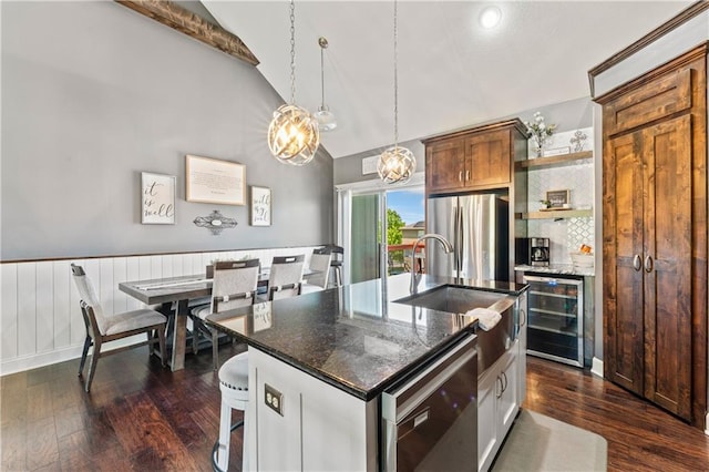 31560 W 85th St, De Soto, KS 66018 - kitchen with wine cooler, a sink, freestanding refrigerator, dark wood-style flooring, and recessed lighting