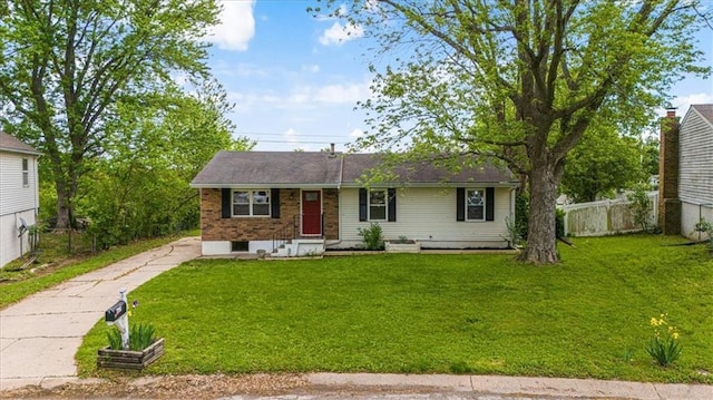 ranch-style home featuring brick siding