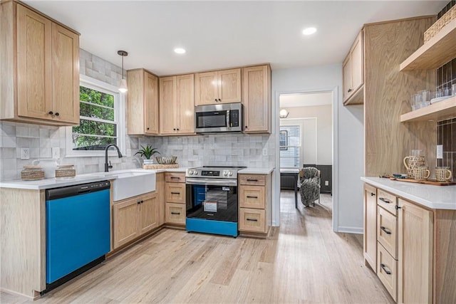 1912 E 153rd Ter, Olathe, KS 66062 - kitchen featuring appliances with stainless steel finishes, light wood-style floors, light brown cabinets, open shelves, and a sink