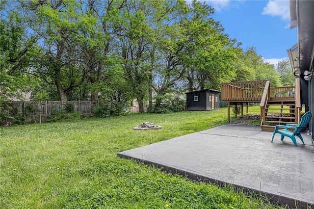 1912 E 153rd Ter, Olathe, KS 66062 - view of yard with a storage shed, stairs, a patio area, a deck, and an outdoor structure