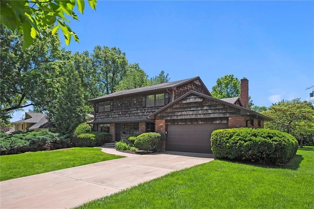 5811 W 85th Ter, Overland Park, KS 66207 - view of front of house with a front lawn, an attached garage, a chimney, and concrete driveway