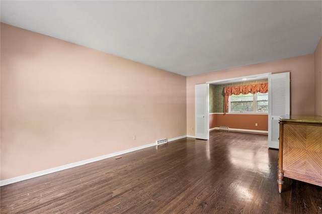 5811 W 85th Ter, Overland Park, KS 66207 - unfurnished room with wood finished floors and baseboards