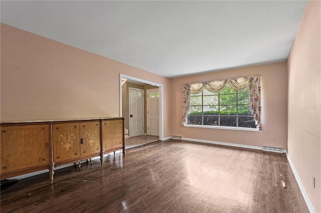 5811 W 85th Ter, Overland Park, KS 66207 - spare room featuring wood finished floors and baseboards