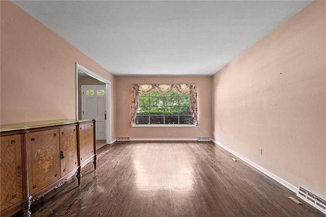5811 W 85th Ter, Overland Park, KS 66207 - empty room with wood finished floors and baseboards