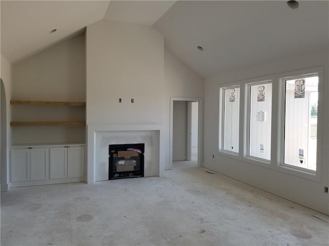 14463 Aurora Ln, Basehor, KS 66007 - unfurnished living room featuring vaulted ceiling and a fireplace