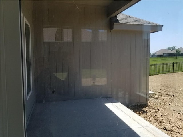 14463 Aurora Ln, Basehor, KS 66007 - view of home's exterior featuring a shingled roof