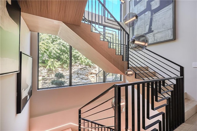 stairs featuring plenty of natural light