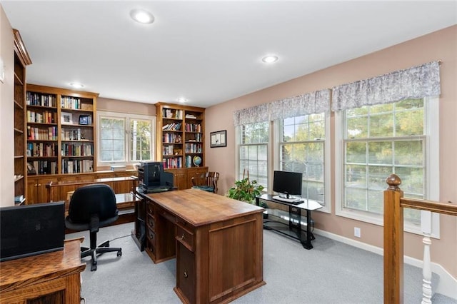 office featuring light colored carpet, recessed lighting, and baseboards