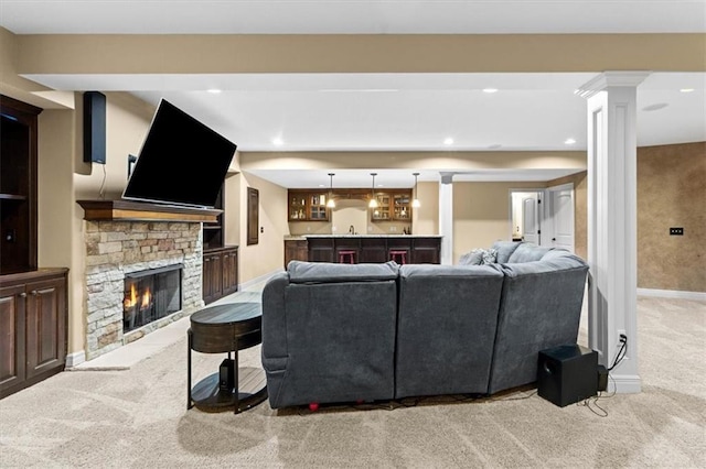 16249 Stearns St, Overland Park, KS 66221 - living area with carpet flooring, wet bar, recessed lighting, baseboards, and ornate columns