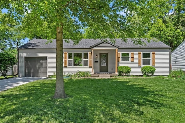 11424 W 68th Pl, Shawnee, KS 66203 - ranch-style house with a garage, concrete driveway, a front yard, and roof with shingles
