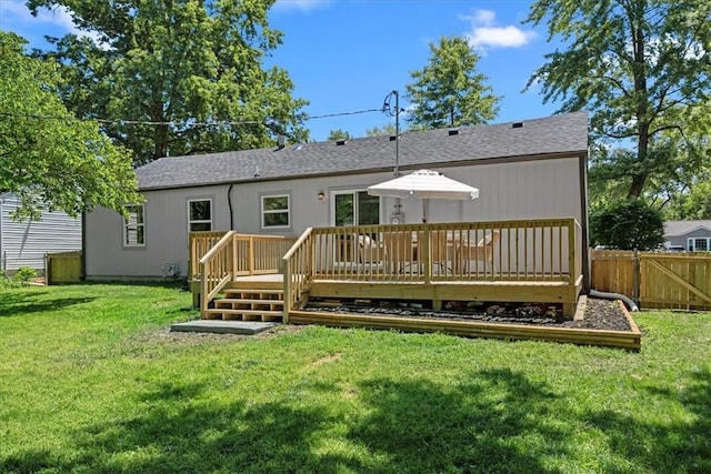 11424 W 68th Pl, Shawnee, KS 66203 - rear view of house featuring a wooden deck and a shingled roof