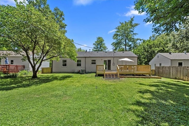 11424 W 68th Pl, Shawnee, KS 66203 - rear view of property featuring central AC unit and a wooden deck